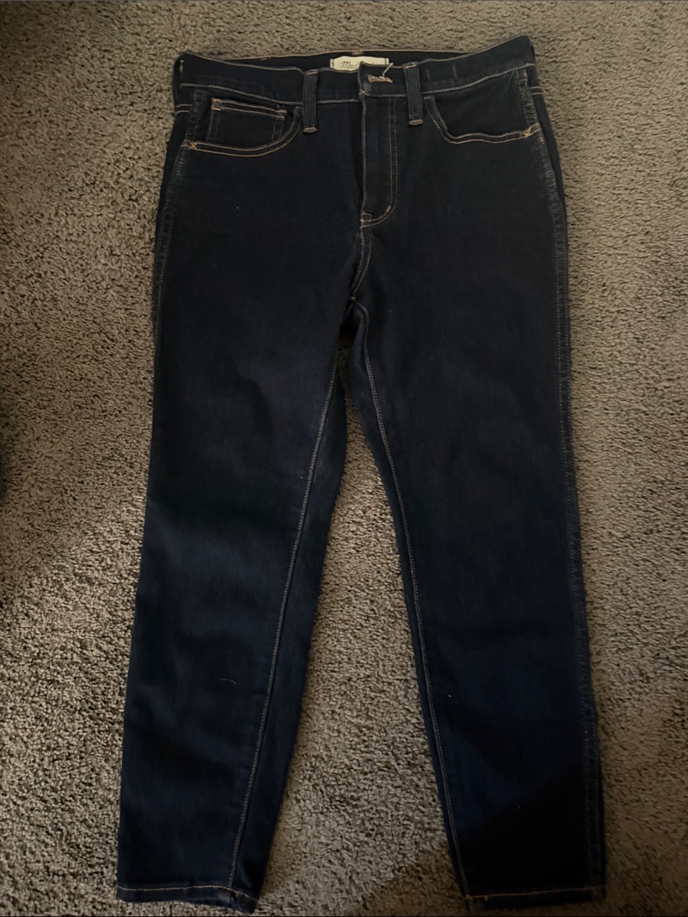 Madewell denim jeans in light blue with tan stitching